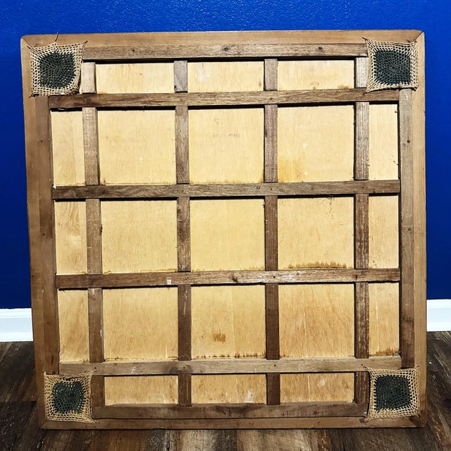 Discover a piece of history with this 32.5x32.5-inch vintage wooden Carrom board, a treasured antique game board that once...