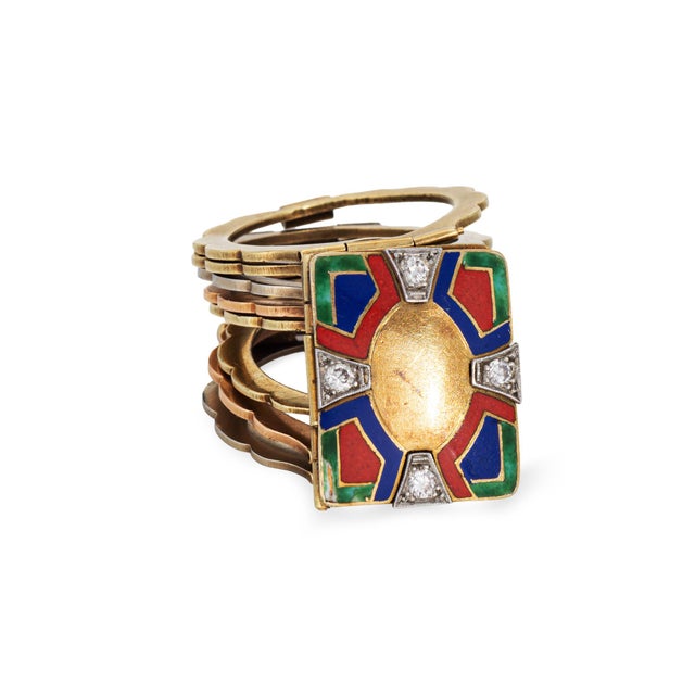 Finely detailed convertible antique ring to bracelet crafted in 14k yellow, rose and white gold (circa 1920s). Four old...
