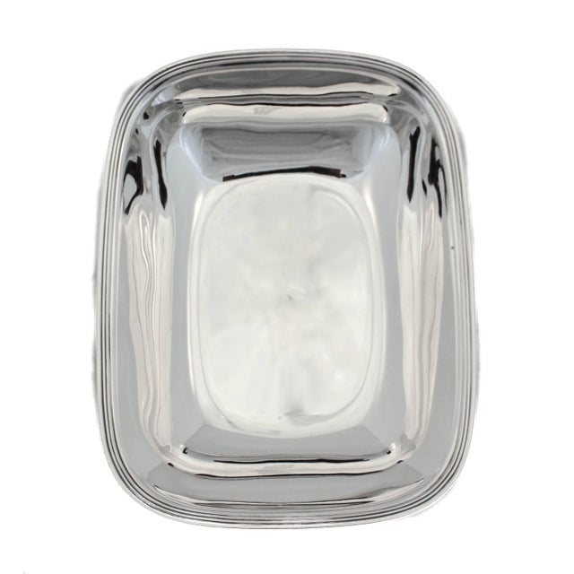 We are thrilled to offer you this pair of sterling silver bowls by the world renowned Tiffany & Company. True to their...