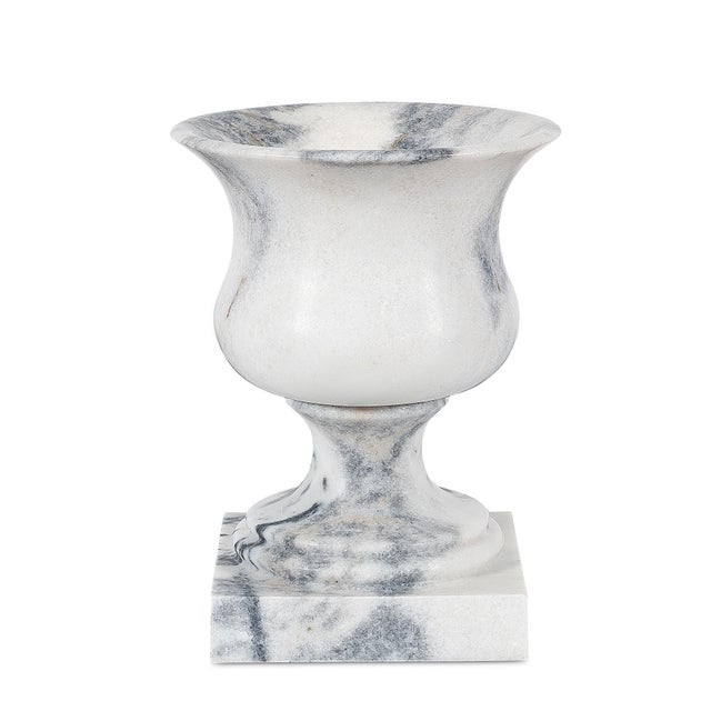 With its sweeping lip and balanced curvature, the vase captures the quiet elegance of classical antiquity. Its...