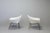 This rare pair of triangular living room chairs was designed by Augusto Bozzi and produced by Saporiti, Italy, in 1950....