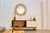 Palafinga is a wood credenza with an open storage compartment and two light-toned drawers. Its raised wood base and clean,...