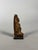 Terracotta sculpture, statuette of the goddess Isis lactans, 28th Dynasty period, 7th-4th century BC. Rests on a black...