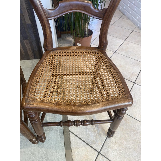 This listing is for a set of 2 chairs. Solid wood frame Cane seat in good condition Good used condition, caning in good...