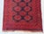 A vintage Afghan Ersari rug carrying two columns of large octagonal "elephant's foot" (Fil-pai) güls — each stepped...