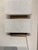 Stylish Revelation Triple Stacked Sconces. Triple white marble lights. Original Retail $909 each. Showroom floor sample.
