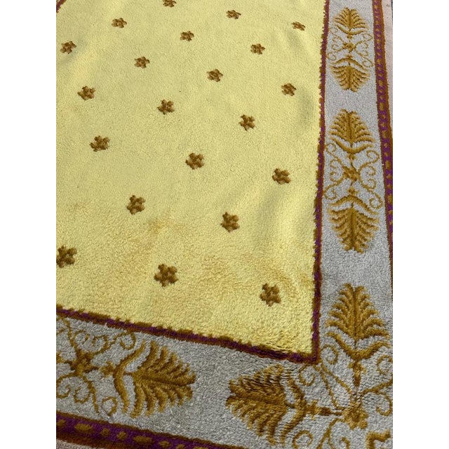 Presenting a regal masterpiece from the prestigious Aubusson manufacturing: an exquisite early 20th-century French...