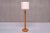 This striking tall floor lamp was produced in Sweden in the 1960s. The Swedish Modern design is characterized by a central...