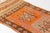 This is a vintage Turkish Oushak rug from the Mid 20th Century. The piece was hand-knotted.