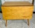 This iconic Mid-Century Modern solid maple drop-leaf dining table is designed by Paul McCobb for the legendary Planner...
