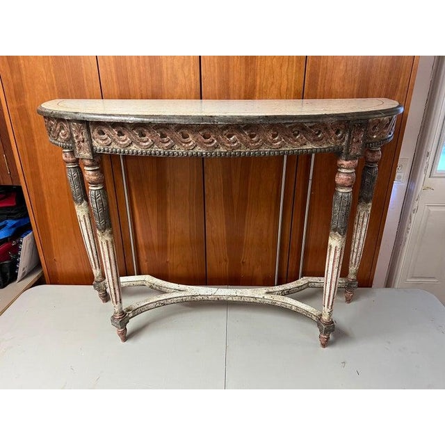 Louis XVI Style Carved Wooden Demilune Console Table. Most likely Italian but no marks. This Louis XVI style demilune will...