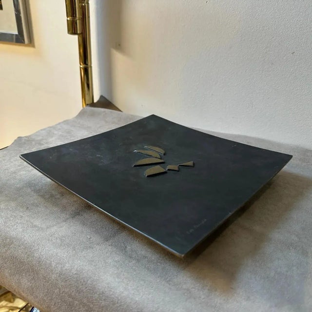 A sculptural black and gilded bronze centerpiece designed by Eva Fedrigolli and manufactured by Esart in the Seventies....