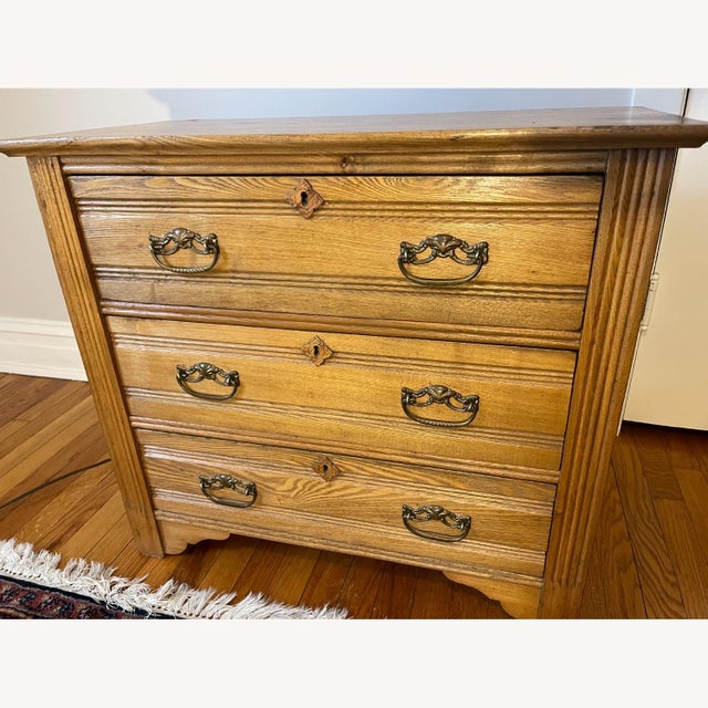 Sturdy and attractive 3-drawer oak dresser. Simple yet attractive detailing.