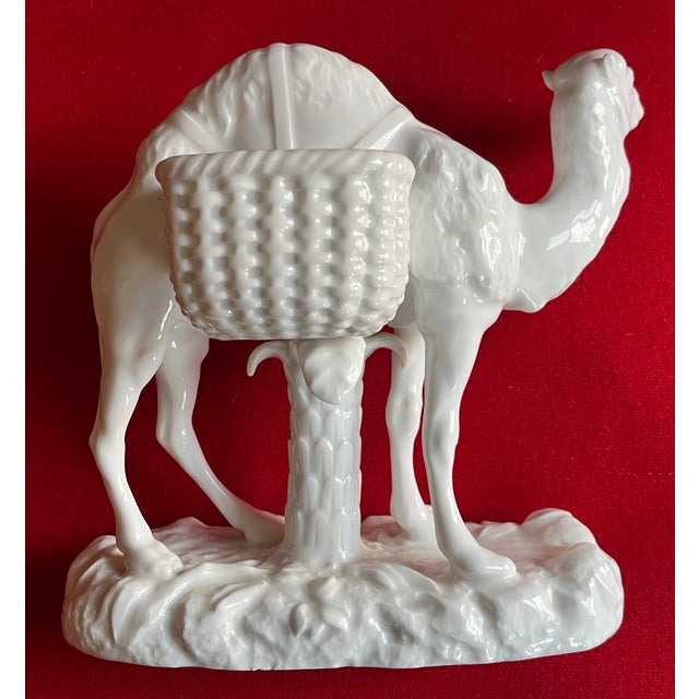 Antique 19th century Continental blanc de Chine porcelain camel centerpiece vase with two baskets for flowers. Exceptional...