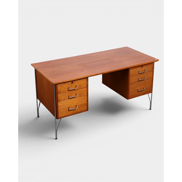 Original Danish desk designed by Heinrich Roepstorff in the 1960s. A distinctive Mid-Century design combining a...