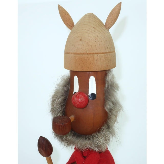 Just in case you need any pillaging and plundering...a 1960's Danish teak viking with birch accents, a felt cape and a fur...