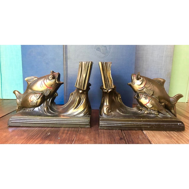Up for sale is an incredibly scarce, highly collectible pair of Antique K&O Co. "Schooling Fish" Metal Bookends....