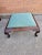 A Victorian Style Mahogany and Upholstered Footstool in great antique condition with newer upholstery. Measures 17.5"...