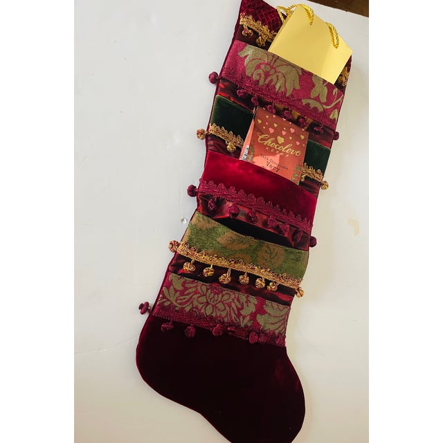 34” long extra large Christmas stocking with 5 pockets in burgundy red velvet and brocade with fringes.