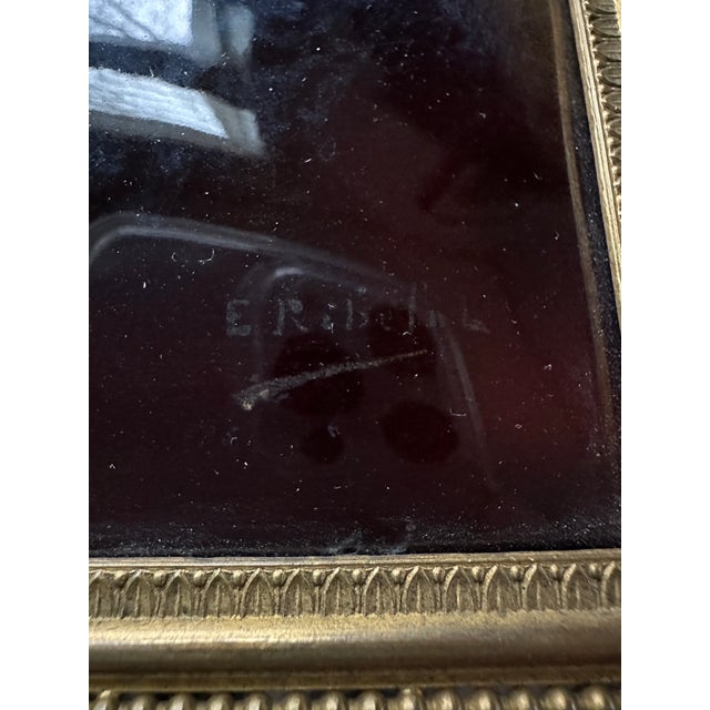 Portrait of a woman on an enameled copper plate framed in a metal frame. Signed E. Ribelola ? If anyone recognizes the...