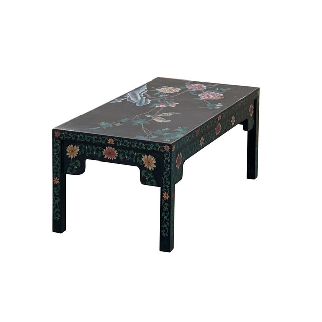 This is a beautiful, low-profile Oriental-style coffee table, likely of Chinese origin, featuring a striking black lacquer...