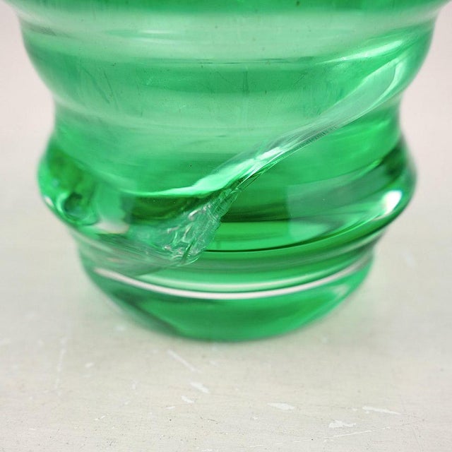 - the vase has an imperfection in the base as per photo. Not tangible to the touch of it externally, much less internally....