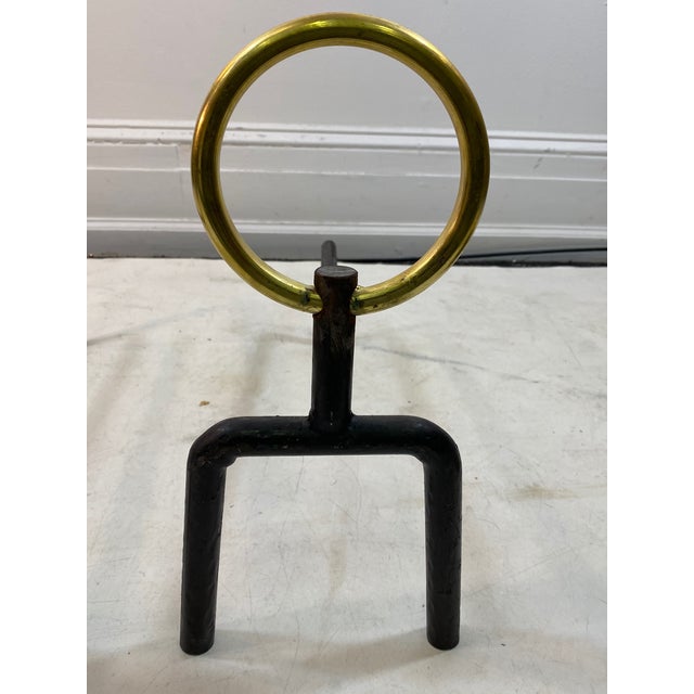 Pair of andirons in the manner of Gio Ponti. 1990’s. Each measure 19” deep, 6” wide, 14 1/2” high. $5,500 for the pair.