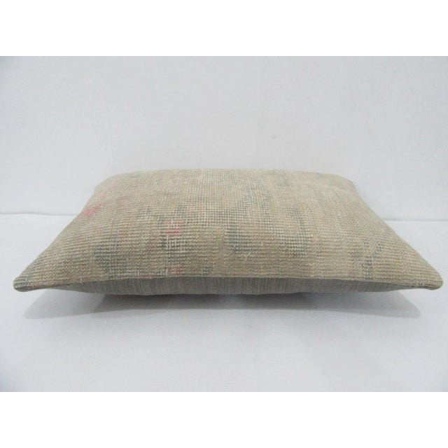Decorative pillow cover made from a vintage Turkish handknotted rug. Backed with good quality cotton fabric. Pillow...