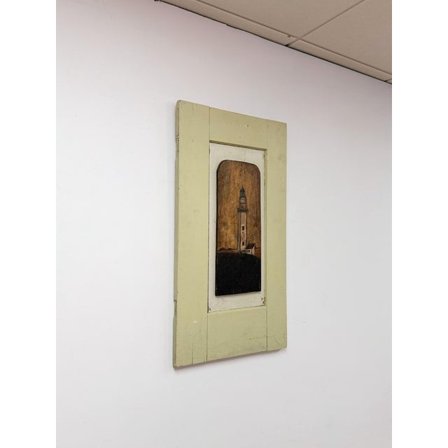 This charming original folk art lighthouse painting on an arched wooden panel is a warm and genuinely characterful coastal...