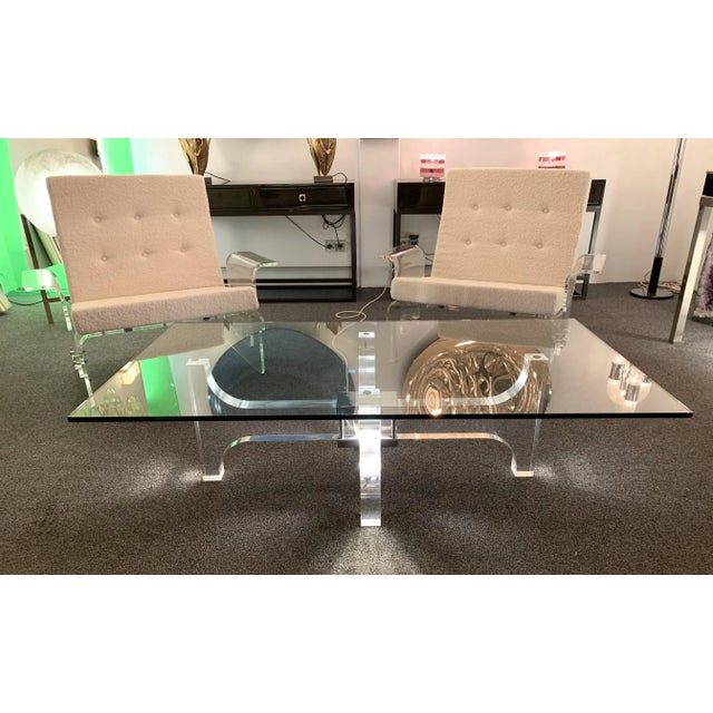 Lightning lucite and metal low coffee or cocktail table with glass top by designer Philippe Jean. Famous design like...