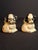 This is a rare matching pair of authentic 1920s vintage/antique cast iron miniature paperweights or favor toys...
