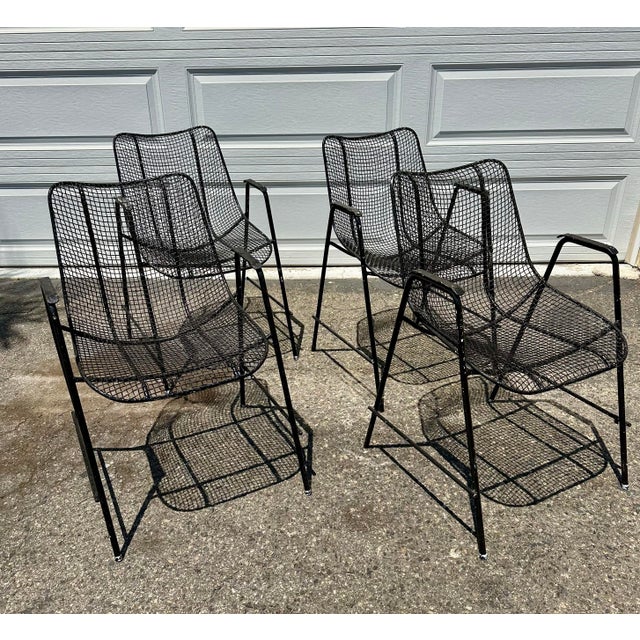 Four vintage mid century modern wrought iron "Sculptura" outdoor patio chairs designed by Russell Woodard for Woodard...