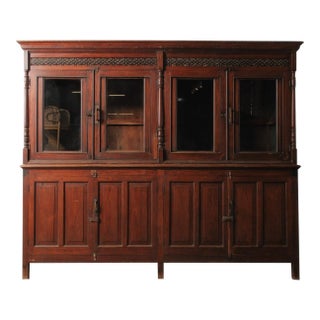 Late 20th Century Large Two-Part Wooden Glass-Front Cabinet With Paneled Base and Carved Detail For Sale