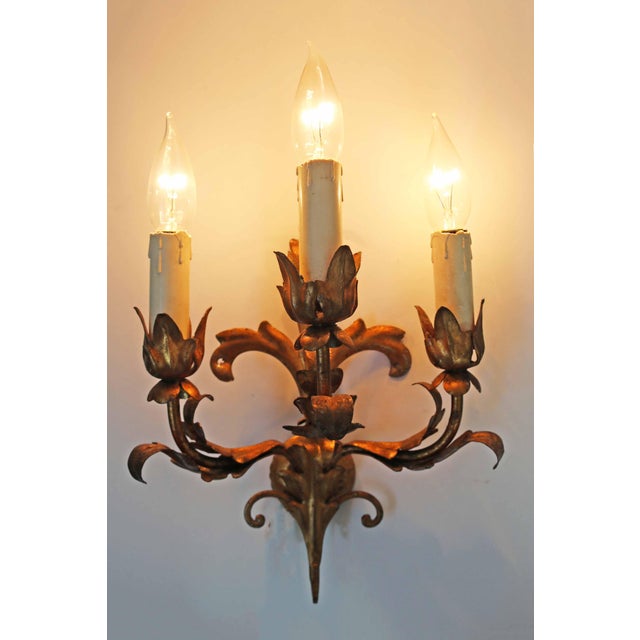 Florentine wall lamp Made in Italy 1970s 3 lights 3 x E14 Height 38cm Width 25cm Depth 14cm Good condition with only minor...