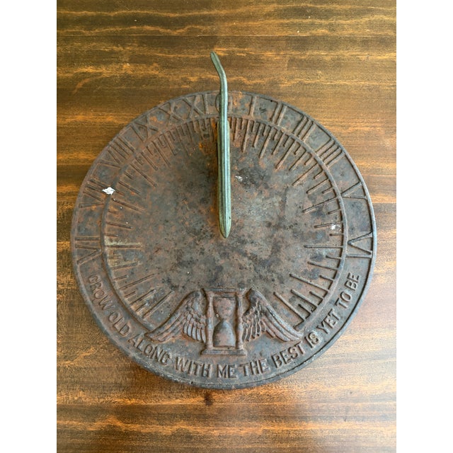 A stunning vintage iron verdigris garden sundial reading "Grow old along with me. The best is yet to be." By Virginia...