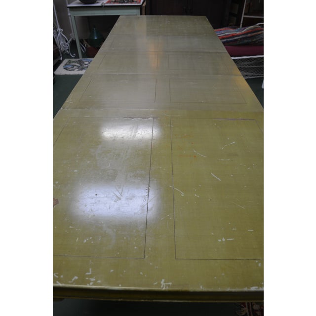 This is an awesome wooden table! I can find nothing on it/about it. Looks vintage & is heavy. It is all green with wear to...