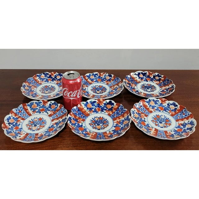 A gorgeous set 6 of matching antique Japanese Imari plates hand decorated with traditional Imari motifs in rich shades of...