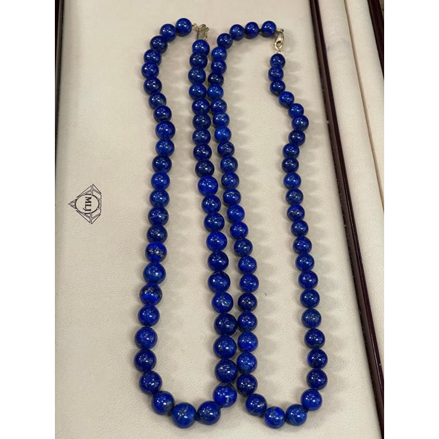 Vintage Lapis Lazuli Single Strand Necklace With 14 Karat Yellow Gold heavy yellow gold lobster clasp This marvelous...