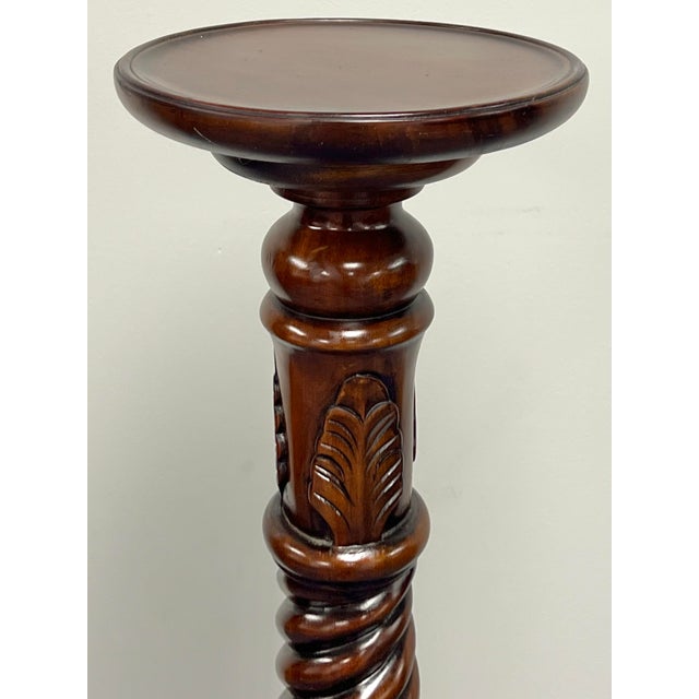 Beautifully carved mahogany plant stand pedestal. Chippendale style with heavily carved ball and claw feet, rope turned...