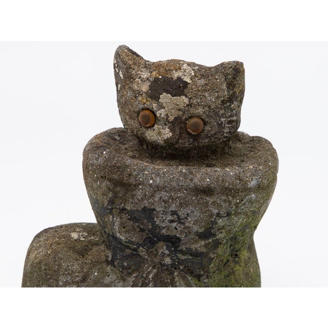 This delightful reconstituted stone kitten in a boot garden ornament adds a touch of whimsy and charm to your outdoor...