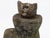 This delightful reconstituted stone kitten in a boot garden ornament adds a touch of whimsy and charm to your outdoor...