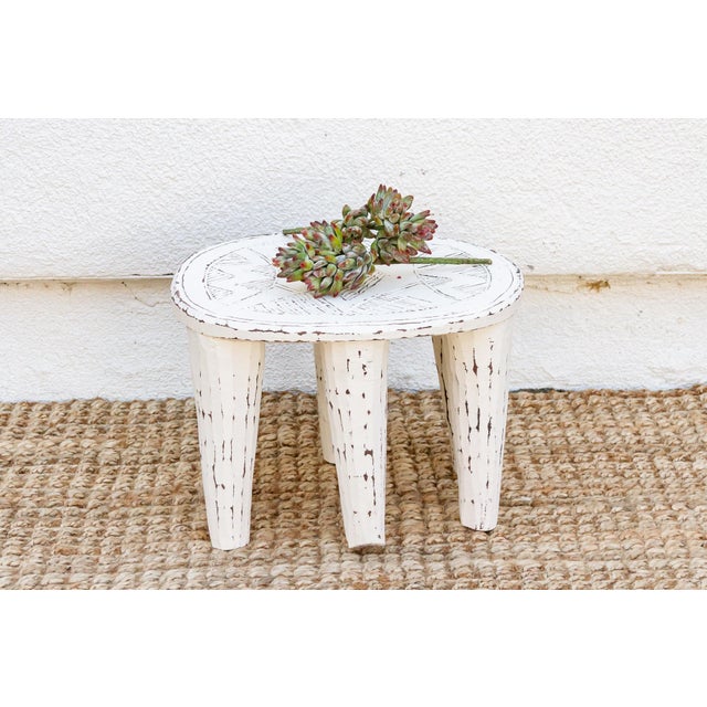 A unique piece of African art, this vintage Nupe table from Nigeria is a must-have for collectors and enthusiasts of Nupe...