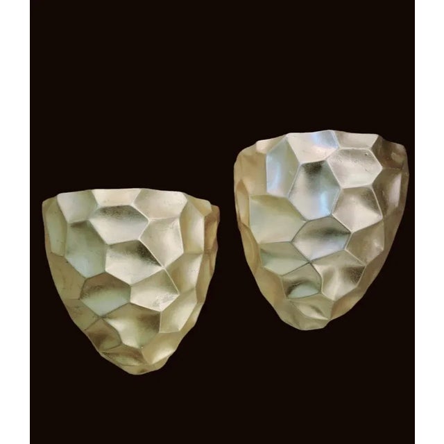 A pair of extremely unique modern faceted chunky geode wall sconce shelf brackets. The shelves are large and have a modern...