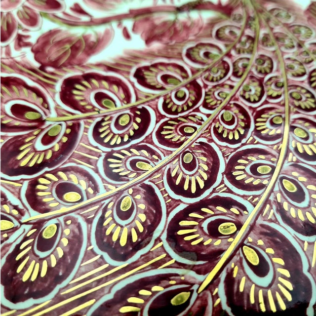 20th Century Delft Red Regina Wall Plate with Peacock Motif and Gold Decoration, Holland, 1950s, in Flawless conditions....