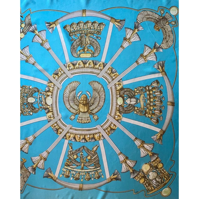 Hermes Egypt Silk Scarf 1970 Turquoise Blue This vibrant and radiant turquoise scarf features cherished themes from...