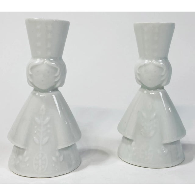 Whimsical ceramic female figure Limoges salt and pepper shakers. Each features wonderful embossed detail to dress and hat....