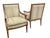 A fabulous pair of Louis xvi style carved bergere lounge chairs. Well carved walnut frames on tapered fluted leg. Ethan...