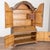 Early 19th century Swedish secretary cabinet, crafted in pine and retaining its original hand painted finish. The stylized...