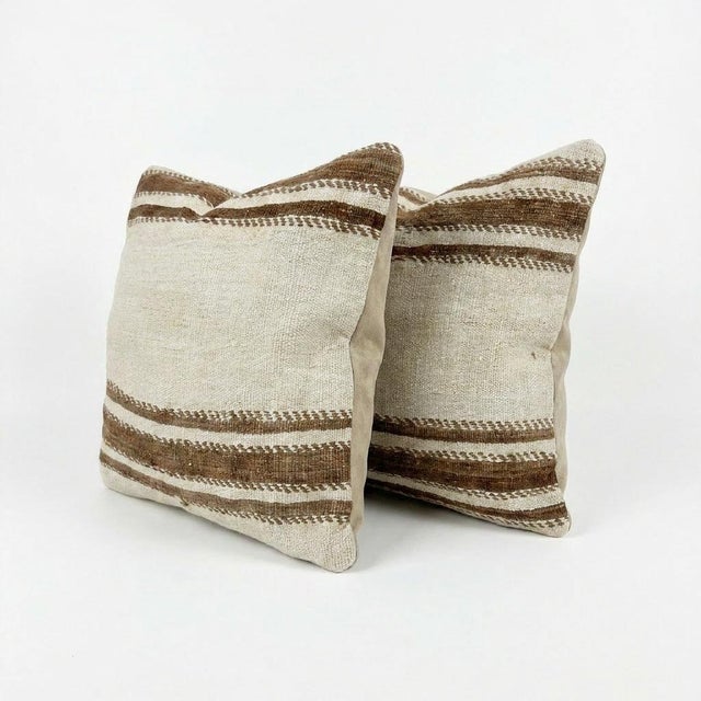 This beautiful 20'' X 20'' pillow cover set was made from authentic Turkish Kilim pieces. Bright colors of wool adorn the...