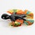 Black Lucite Carved Samba Dancer Figurine Brooch with Colorful Raffia For Sale - Image 9 of 9